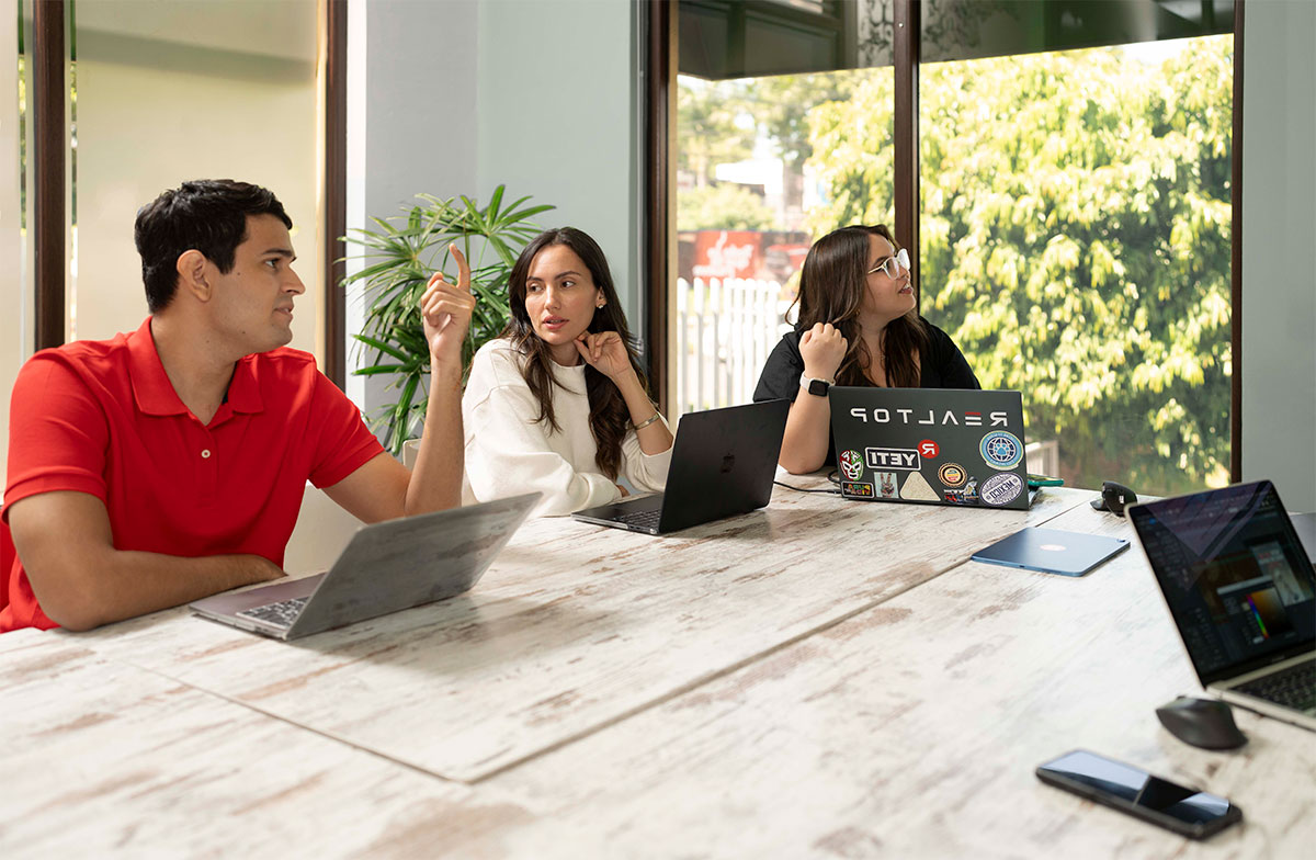REALTOP digital marketing services team working on campaign strategy Digital Marketing Services