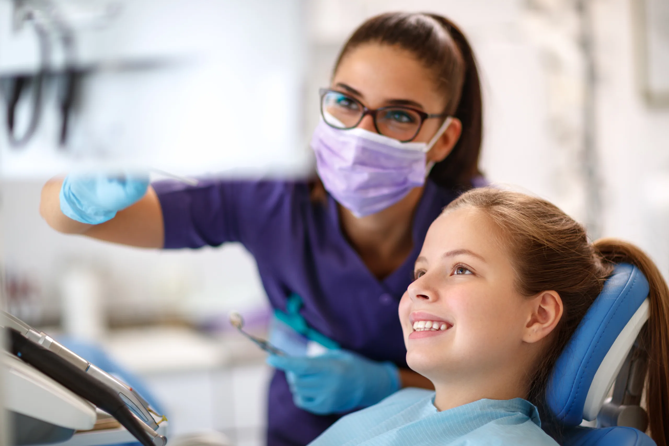 Dental marketing team helping a dentist review digital strategy and patient growth opportunities